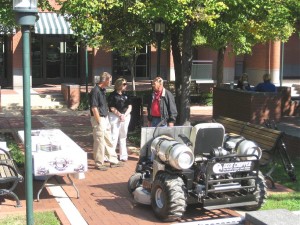 A propane riding mower - with large tanks on either side of the driver